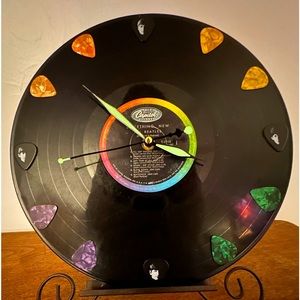 Vintage Beatles vinyl record clock .